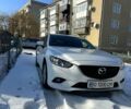 Білий Мазда 6, об'ємом двигуна 2.2 л та пробігом 215 тис. км за 12500 $, фото 1 на Automoto.ua