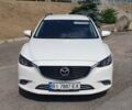 Білий Мазда 6, об'ємом двигуна 2.19 л та пробігом 178 тис. км за 13999 $, фото 1 на Automoto.ua