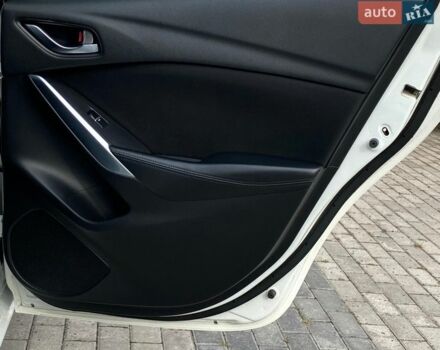 Белый Мазда 6, объемом двигателя 2 л и пробегом 130 тыс. км за 130 $, фото 20 на Automoto.ua