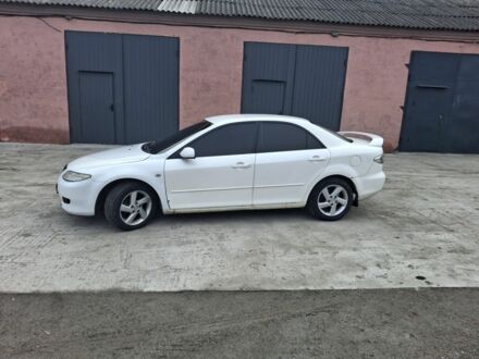 Білий Мазда 6, об'ємом двигуна 2 л та пробігом 425 тис. км за 1500 $, фото 1 на Automoto.ua