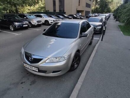 Белый Мазда 6, объемом двигателя 2 л и пробегом 180 тыс. км за 5500 $, фото 1 на Automoto.ua