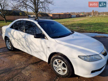 Белый Мазда 6, объемом двигателя 2 л и пробегом 340 тыс. км за 3700 $, фото 1 на Automoto.ua
