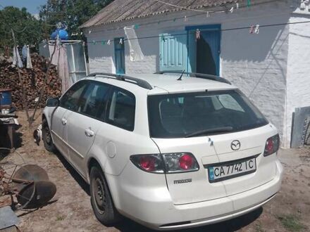 Белый Мазда 6, объемом двигателя 2 л и пробегом 290 тыс. км за 4200 $, фото 1 на Automoto.ua