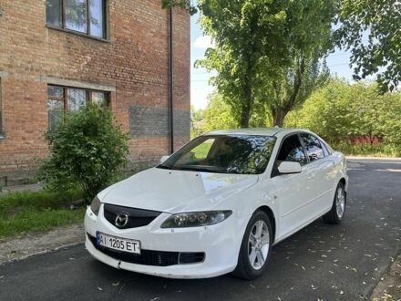 Білий Мазда 6, об'ємом двигуна 2 л та пробігом 299 тис. км за 1650 $, фото 1 на Automoto.ua