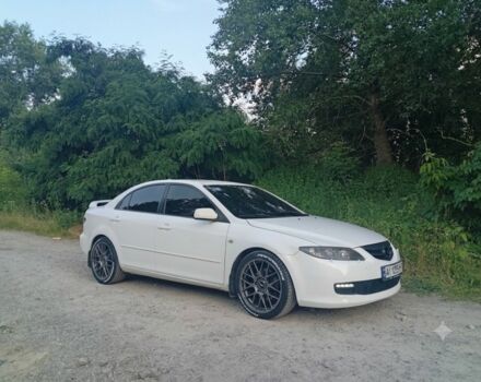 Белый Мазда 6, объемом двигателя 2 л и пробегом 235 тыс. км за 4156 $, фото 1 на Automoto.ua