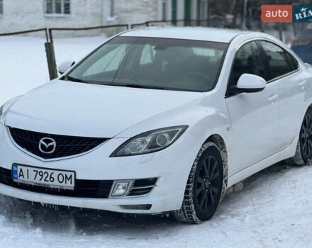 Белый Мазда 6, объемом двигателя 2 л и пробегом 244 тыс. км за 6600 $, фото 1 на Automoto.ua
