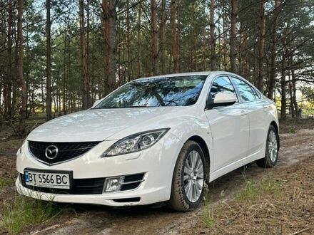 Белый Мазда 6, объемом двигателя 2 л и пробегом 180 тыс. км за 5900 $, фото 1 на Automoto.ua