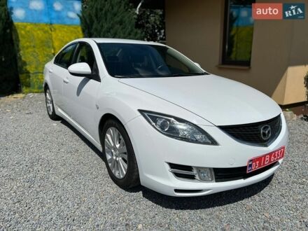 Белый Мазда 6, объемом двигателя 2 л и пробегом 180 тыс. км за 7900 $, фото 1 на Automoto.ua