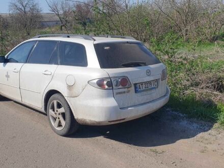 Білий Мазда 6, об'ємом двигуна 2 л та пробігом 260 тис. км за 3500 $, фото 1 на Automoto.ua