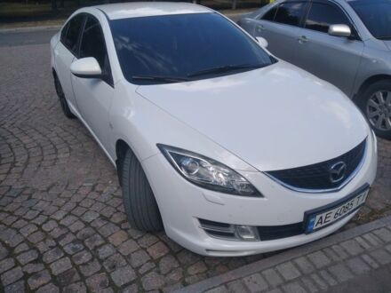 Белый Мазда 6, объемом двигателя 2 л и пробегом 190 тыс. км за 6678 $, фото 1 на Automoto.ua