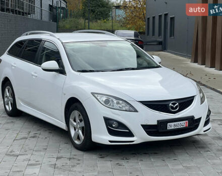 Белый Мазда 6, объемом двигателя 2 л и пробегом 204 тыс. км за 6800 $, фото 1 на Automoto.ua