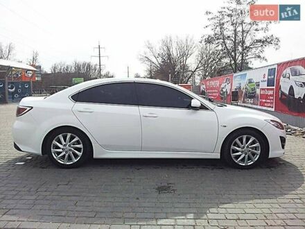 Белый Мазда 6, объемом двигателя 2 л и пробегом 101 тыс. км за 10000 $, фото 1 на Automoto.ua