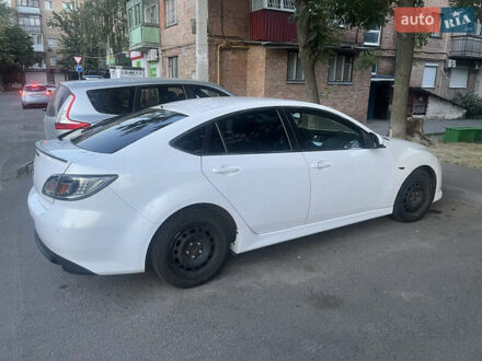 Белый Мазда 6, объемом двигателя 2.18 л и пробегом 245 тыс. км за 6666 $, фото 1 на Automoto.ua