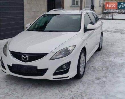 Белый Мазда 6, объемом двигателя 2 л и пробегом 210 тыс. км за 8500 $, фото 1 на Automoto.ua