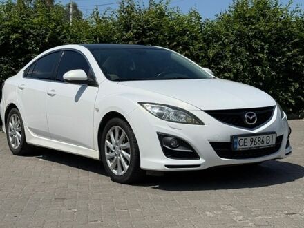Белый Мазда 6, объемом двигателя 2 л и пробегом 168 тыс. км за 8999 $, фото 1 на Automoto.ua