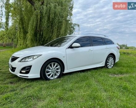 Белый Мазда 6, объемом двигателя 2 л и пробегом 236 тыс. км за 8500 $, фото 1 на Automoto.ua