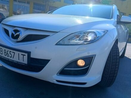 Білий Мазда 6, об'ємом двигуна 2.18 л та пробігом 316 тис. км за 8499 $, фото 1 на Automoto.ua