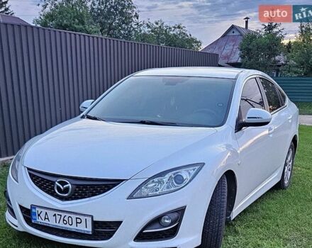 Белый Мазда 6, объемом двигателя 2.18 л и пробегом 308 тыс. км за 7000 $, фото 1 на Automoto.ua