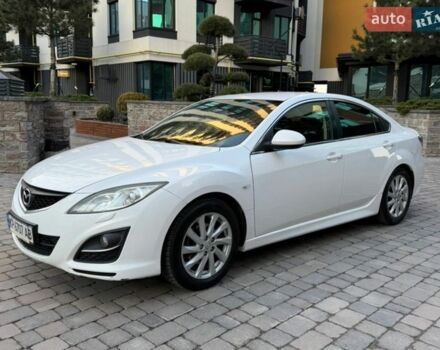 Белый Мазда 6, объемом двигателя 2 л и пробегом 217 тыс. км за 7100 $, фото 1 на Automoto.ua