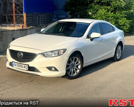 Белый Мазда 6, объемом двигателя 2 л и пробегом 247 тыс. км за 11000 $, фото 1 на Automoto.ua