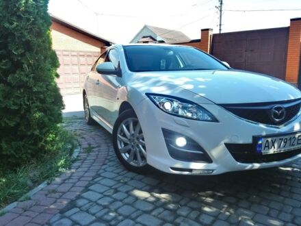 Білий Мазда 6, об'ємом двигуна 2 л та пробігом 86 тис. км за 12900 $, фото 1 на Automoto.ua