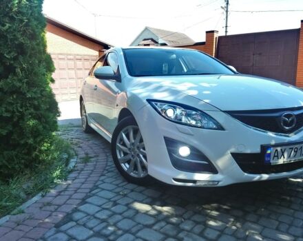 Белый Мазда 6, объемом двигателя 2 л и пробегом 86 тыс. км за 12900 $, фото 1 на Automoto.ua