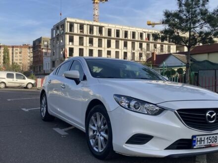 Білий Мазда 6, об'ємом двигуна 2.5 л та пробігом 200 тис. км за 12500 $, фото 1 на Automoto.ua