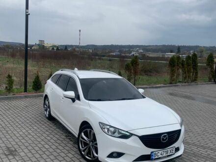Белый Мазда 6, объемом двигателя 2.18 л и пробегом 252 тыс. км за 9600 $, фото 1 на Automoto.ua