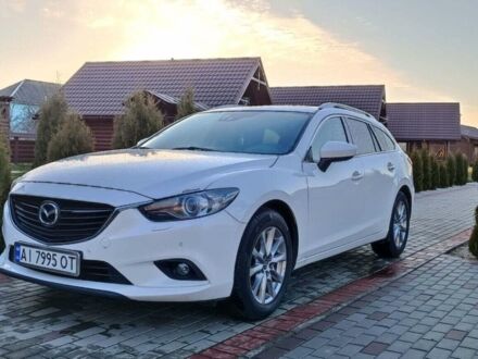 Білий Мазда 6, об'ємом двигуна 2.19 л та пробігом 287 тис. км за 14200 $, фото 1 на Automoto.ua
