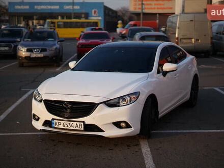 Белый Мазда 6, объемом двигателя 2 л и пробегом 190 тыс. км за 11650 $, фото 1 на Automoto.ua