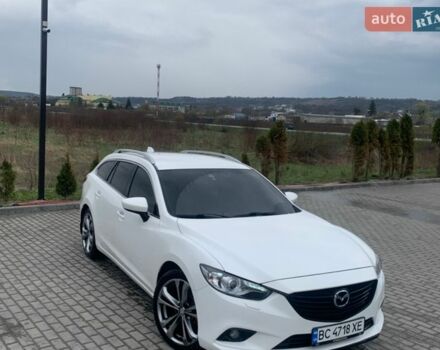 Белый Мазда 6, объемом двигателя 2.18 л и пробегом 252 тыс. км за 10400 $, фото 1 на Automoto.ua