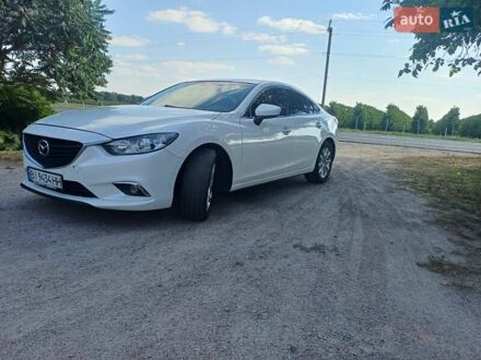 Белый Мазда 6, объемом двигателя 2.49 л и пробегом 200 тыс. км за 11200 $, фото 1 на Automoto.ua
