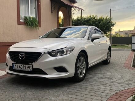 Білий Мазда 6, об'ємом двигуна 2 л та пробігом 135 тис. км за 12895 $, фото 1 на Automoto.ua