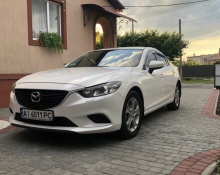 Белый Мазда 6, объемом двигателя 2 л и пробегом 135 тыс. км за 12895 $, фото 1 на Automoto.ua