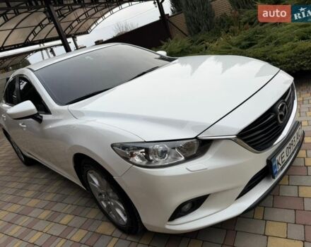 Белый Мазда 6, объемом двигателя 2 л и пробегом 189 тыс. км за 12700 $, фото 1 на Automoto.ua