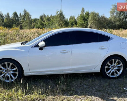 Белый Мазда 6, объемом двигателя 2.49 л и пробегом 239 тыс. км за 11300 $, фото 1 на Automoto.ua