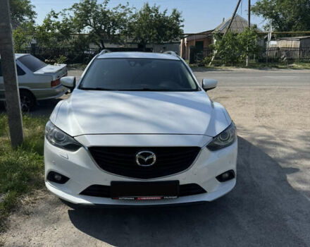 Белый Мазда 6, объемом двигателя 2.2 л и пробегом 230 тыс. км за 12800 $, фото 1 на Automoto.ua