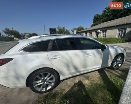Белый Мазда 6, объемом двигателя 2.2 л и пробегом 230 тыс. км за 10800 $, фото 1 на Automoto.ua