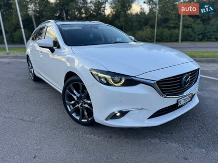 Білий Мазда 6, об'ємом двигуна 2.2 л та пробігом 244 тис. км за 13750 $, фото 1 на Automoto.ua