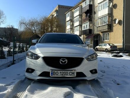 Білий Мазда 6, об'ємом двигуна 2.2 л та пробігом 215 тис. км за 12500 $, фото 1 на Automoto.ua