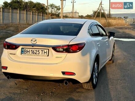 Белый Мазда 6, объемом двигателя 2 л и пробегом 79 тыс. км за 13500 $, фото 1 на Automoto.ua