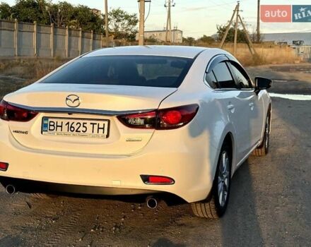Белый Мазда 6, объемом двигателя 2 л и пробегом 79 тыс. км за 13500 $, фото 1 на Automoto.ua