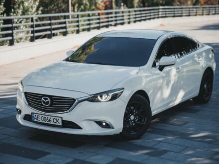 Белый Мазда 6, объемом двигателя 2.5 л и пробегом 106 тыс. км за 13000 $, фото 1 на Automoto.ua