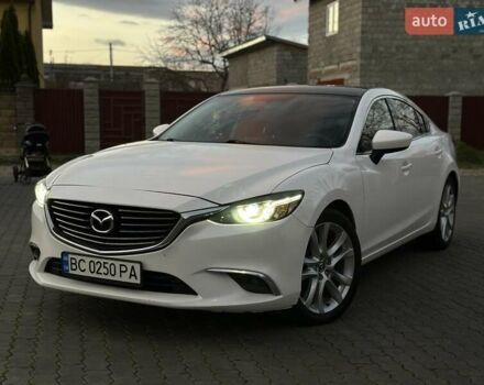 Белый Мазда 6, объемом двигателя 2.49 л и пробегом 187 тыс. км за 14500 $, фото 1 на Automoto.ua