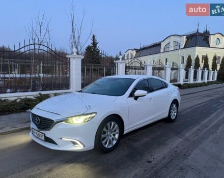Белый Мазда 6, объемом двигателя 2.49 л и пробегом 225 тыс. км за 8700 $, фото 1 на Automoto.ua