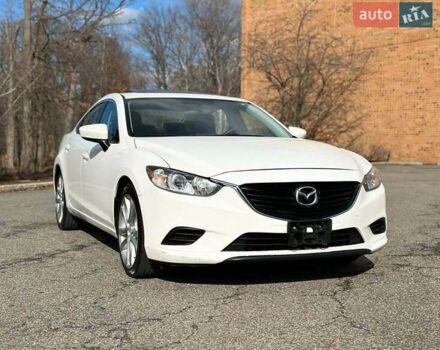 Белый Мазда 6, объемом двигателя 2.49 л и пробегом 75 тыс. км за 16000 $, фото 1 на Automoto.ua