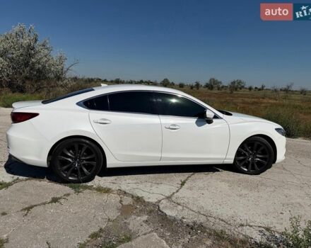 Белый Мазда 6, объемом двигателя 2.49 л и пробегом 142 тыс. км за 13500 $, фото 1 на Automoto.ua