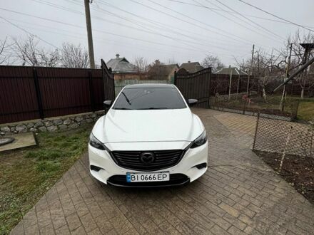 Белый Мазда 6, объемом двигателя 2.45 л и пробегом 188 тыс. км за 11500 $, фото 1 на Automoto.ua