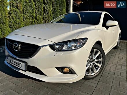 Білий Мазда 6, об'ємом двигуна 2 л та пробігом 204 тис. км за 12950 $, фото 1 на Automoto.ua