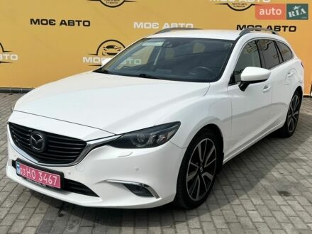 Белый Мазда 6, объемом двигателя 2.2 л и пробегом 170 тыс. км за 13300 $, фото 1 на Automoto.ua